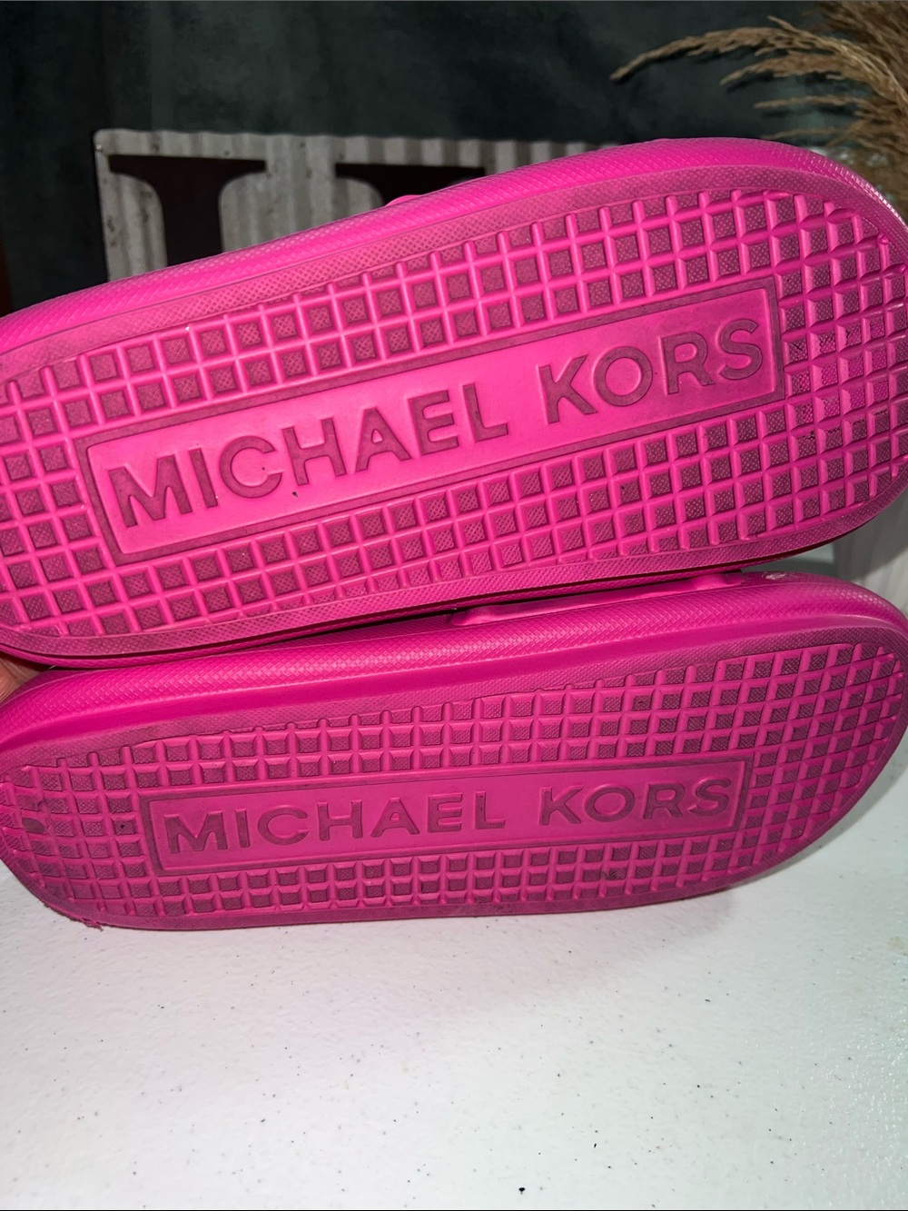 Michael Kors Splash Slide sandals in a bright cerise pink color. - Picture 4 of 6